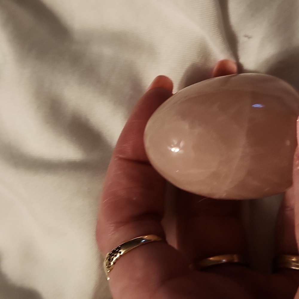 Rose quartz egg with stand